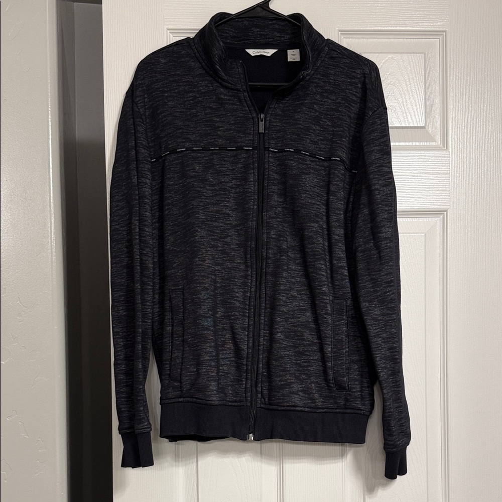 65.  Calvin Klein Men's Charcoal Zip-Up Sweater